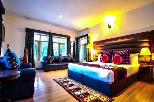 Voodi või voodid majutusasutuse Gomang Boutique Hotel toas