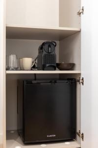 Kuchyň nebo kuchyňský kout v ubytování Palace Luxury Suites + 65 fotografií