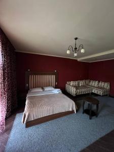 Postel nebo postele na pokoji v ubytování Гетьман Готель & SPA
