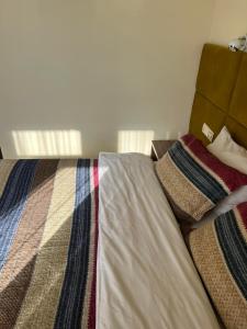 Postel nebo postele na pokoji v ubytování Гетьман Готель & SPA