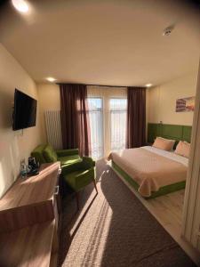 Postel nebo postele na pokoji v ubytování Гетьман Готель & SPA