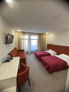 Postel nebo postele na pokoji v ubytování Гетьман Готель & SPA