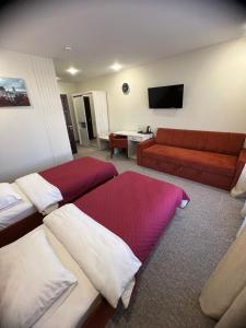 Postel nebo postele na pokoji v ubytování Гетьман Готель & SPA