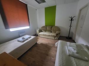 Postel nebo postele na pokoji v ubytování H18B EUROHOTEL