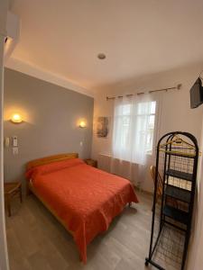 Postel nebo postele na pokoji v ubytování HOTEL LE FLOREAL