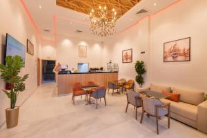 Coin salon dans l'établissement Appart Hôtel Rambla