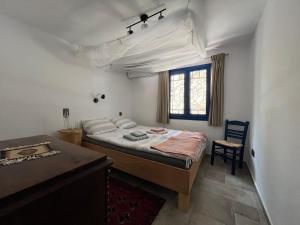 Postel nebo postele na pokoji v ubytování Ferienhaus Asterousia