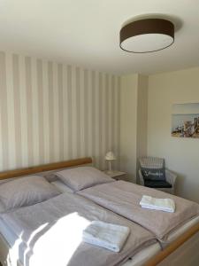 Postel nebo postele na pokoji v ubytování Haus-Seeschwalbe