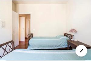 Krevet ili kreveti u jedinici u okviru objekta Cozy room in Palazzo Magnalbò