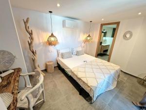 Postel nebo postele na pokoji v ubytování Villa Lomy Casares
