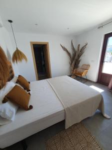 Postel nebo postele na pokoji v ubytování Villa Lomy Casares