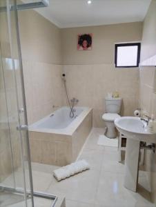 Ένα μπάνιο στο Cosy Home in Bluewater Bay +45 φωτογραφίες