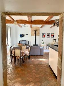 Et opholdsområde på L’Appartement-La Ferme du Bois