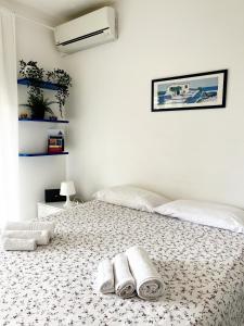 Postel nebo postele na pokoji v ubytování Suite Gardenia