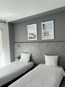 Postel nebo postele na pokoji v ubytování Acapella Hotel + 37 fotografií