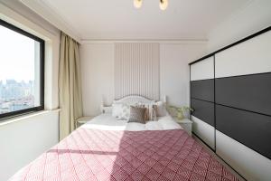 Voodi või voodid majutusasutuse Shanghai Downtown Yi Du B&B - Near Jing'an Temple Subway 200 meters and shopping mall toas