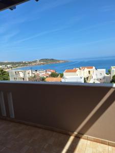 a balcony with a view of the ocean at Evangelia in Karfas