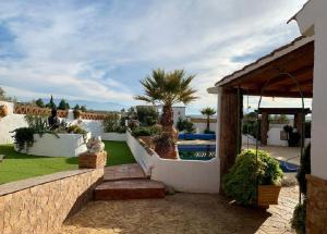 A garden outside Cueva Romana Cave House, Clothing Optional, Adult Only