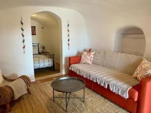 A seating area at Cueva Romana Cave House, Clothing Optional, Adult Only