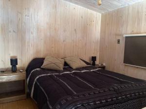 Cama ou camas em um quarto em Loft Siete Reserva
