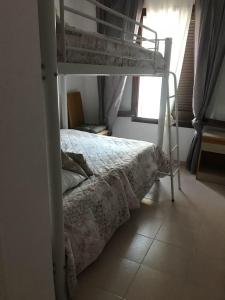 Postel nebo postele na pokoji v ubytování Chalet entre playas