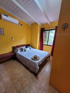 Postel nebo postele na pokoji v ubytování Ombú Guests House