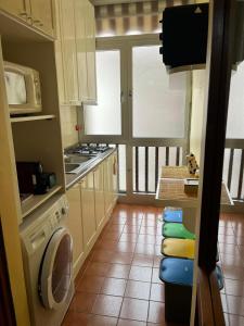 Ett kök eller pentry på Valentinas Rent Apartment Casa Vacanze Alghero