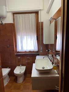Ett badrum på Valentinas Rent Apartment Casa Vacanze Alghero