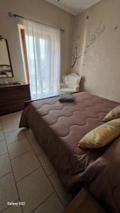 Postel nebo postele na pokoji v ubytování CORTE RITALTONI