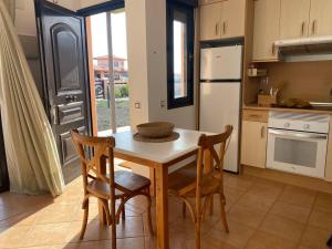 Η κουζίνα ή μικρή κουζίνα στο Mi Casa +9 φωτογραφίες