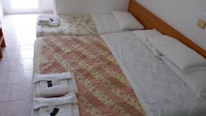 Postel nebo postele na pokoji v ubytování Albergo ristorante Elena