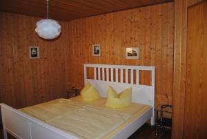 Ένα ή περισσότερα κρεβάτια σε δωμάτιο στο Bergpanorama Ruhla