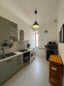 Köök või kööginurk majutusasutuses Penthouse 23 - Vatican Charming Apartment