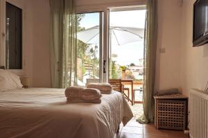 Postel nebo postele na pokoji v ubytování Villa Aura - Villa in Peyia