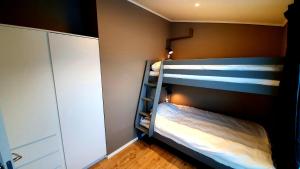 Postel nebo postele na pokoji v ubytování Katterjåkk Apartments