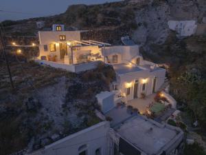 an aerial view of a home at night at Sunlight Cave Agrilia in Thirasia