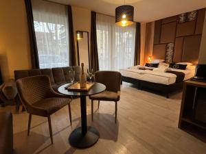 Postel nebo postele na pokoji v ubytování Baobab Suites