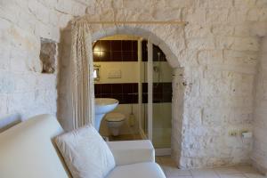 Posezení v ubytování Trulli Lisanna - Luxury Trulli With Private Pool