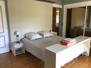 Postel nebo postele na pokoji v ubytování VILLA BOSC VIEL