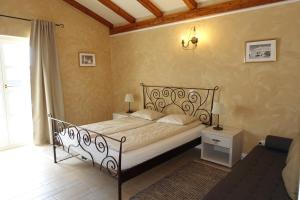 a bedroom with a bed in a room at Villa Emma Smoljanci 76 in Svetvinčenat +44 photos