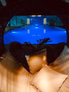 a view of a swimming pool at night at Steffen Resort in Dinalupihan