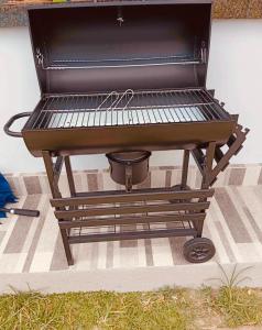 a barbecue grill sitting on top of a table at Steffen Resort in Dinalupihan