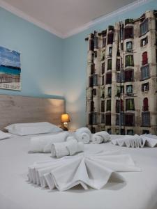 A bed or beds in a room at Green House Skiathos