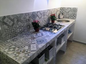 A kitchen or kitchenette at Acquadellarte B&B