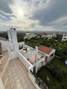 an aerial view of a balcony of a house at LOFT HOUSE in Vrahati +15 photos