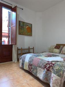 Posteľ alebo postele v izbe v ubytovaní Preciosa vivienda enorme y totalmente equipada en el centro de Figueres
