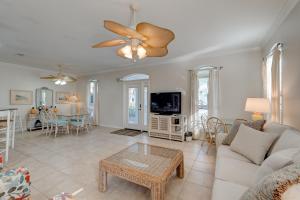 a living room with a couch and a table at Martinique Close To Beach Pet Friendly in Destin