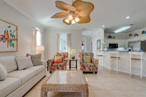 a living room with a couch and a table at Martinique Close To Beach Pet Friendly in Destin