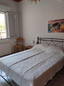 Katil atau katil-katil dalam bilik di Εξοχική κατοικία Αnna's house