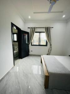 Postel nebo postele na pokoji v ubytování DSD-Apartments + 2 fotografie